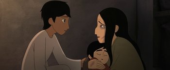 Movie still from “The Breadwinner” (2017), directed by Nora Twomey – An illustration of a woman holding a child and a boy; Close Up shot, Over the shoulder angle