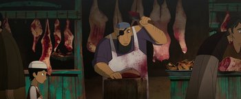 Movie still from “The Breadwinner” (2017), directed by Nora Twomey – An animated character is holding an ax and a knife; Medium shot, High angle