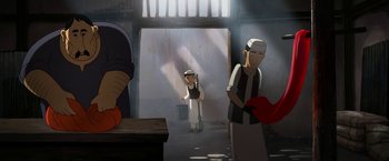 Movie still from “The Breadwinner” (2017), directed by Nora Twomey – An animated scene of a man and a woman in a kitchen; Medium shot, Low angle