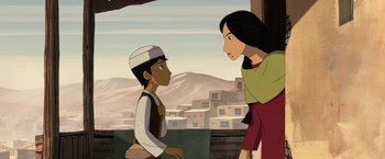 Movie still from “The Breadwinner” (2017), directed by Nora Twomey – Two people standing next to each other in front of a city; Medium shot, Over the shoulder angle