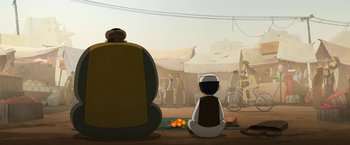 Movie still from “The Breadwinner” (2017), directed by Nora Twomey – Two people sitting on the ground in front of a fire pit; Wide shot, Low angle