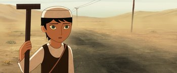 Movie still from “The Breadwinner” (2017), directed by Nora Twomey – An animated picture of a person in a desert; Close Up shot, Over the shoulder angle