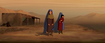Movie still from “The Breadwinner” (2017), directed by Nora Twomey – Two women standing next to each other on a dirt field; Wide shot, Low angle