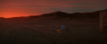 Movie still from “The Breadwinner” (2017), directed by Nora Twomey – An image of a desert with a fire in the background; Extreme Wide shot, Low angle