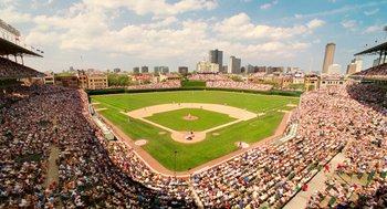Movie still from “The Break-Up” (2006), directed by Peyton Reed – An aerial view of a baseball field with a lot of people watching it; Extreme Wide shot, High angle