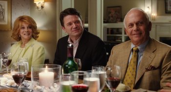Movie still from “The Break-Up” (2006), directed by Peyton Reed – A group of people sitting at a dinner table; Medium shot, Over the shoulder angle
