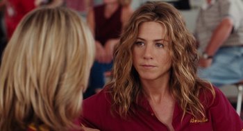 Movie still from “The Break-Up” (2006), directed by Peyton Reed – A woman in a red shirt looking at another woman in a red shirt; Close Up shot, Over the shoulder angle