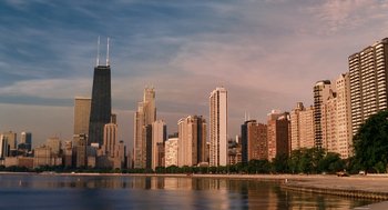 Movie still from “The Break-Up” (2006), directed by Peyton Reed – A view of a city skyline from across the water; Extreme Wide shot, High angle