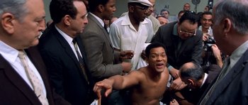 Movie still from “Ali” (2001), directed by Michael Mann – Medium shot, Low angle