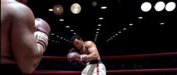 Movie still from “Ali” (2001), directed by Michael Mann – Medium shot, Low angle