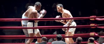 Movie still from “Ali” (2001), directed by Michael Mann – Medium shot, Low angle