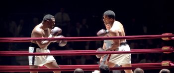 Movie still from “Ali” (2001), directed by Michael Mann – Medium shot, High angle