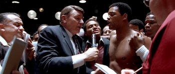 Movie still from “Ali” (2001), directed by Michael Mann – Medium shot, Low angle