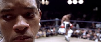 Movie still from “Ali” (2001), directed by Michael Mann – Close Up shot, Over the shoulder angle
