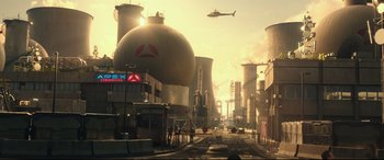 Movie still from “Godzilla vs. Kong” (2021), directed by Adam Wingard – An industrial area with a helicopter flying overhead; Extreme Wide shot, High angle