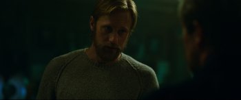 Movie still from “Godzilla vs. Kong” (2021), directed by Adam Wingard – A person wearing a sweater; Close Up shot, Over the shoulder angle