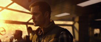 Movie still from “Godzilla vs. Kong” (2021), directed by Adam Wingard – A person wearing a jacket; Close Up shot, Over the shoulder angle