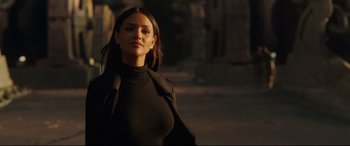 Movie still from “Godzilla vs. Kong” (2021), directed by Adam Wingard – A woman in a black top and a black jacket; Close Up shot, Over the shoulder angle