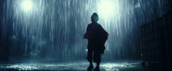 Movie still from “Godzilla vs. Kong” (2021), directed by Adam Wingard – A person standing in front of a waterfall; Wide shot, Low angle