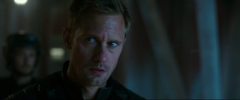 Movie still from “Godzilla vs. Kong” (2021), directed by Adam Wingard – A person wearing a black shirt; Close Up shot, Over the shoulder angle