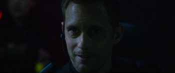 Movie still from “Godzilla vs. Kong” (2021), directed by Adam Wingard – A person wearing a headset; Close Up shot, Over the shoulder angle