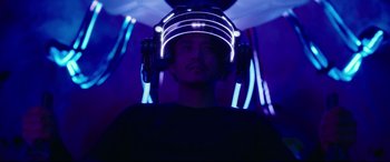 Movie still from “Godzilla vs. Kong” (2021), directed by Adam Wingard – A man wearing a helmet with lights around it; Close Up shot, Low angle