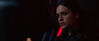 Movie still from “Godzilla vs. Kong” (2021), directed by Adam Wingard – A beautiful young woman in a black jacket; Close Up shot, Low angle