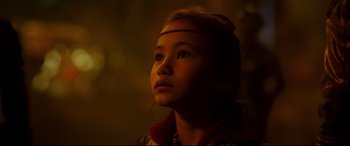 Movie still from “Godzilla vs. Kong” (2021), directed by Adam Wingard – A young girl is looking into the distance; Close Up shot, Low angle