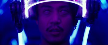 Movie still from “Godzilla vs. Kong” (2021), directed by Adam Wingard – A person wearing a hat; Close Up shot, Low angle