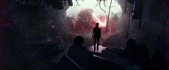 Movie still from “Godzilla vs. Kong” (2021), directed by Adam Wingard – A man standing in front of an exploding building; Extreme Wide shot, Low angle