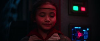 Movie still from “Godzilla vs. Kong” (2021), directed by Adam Wingard – A young girl with her eyes closed in a dark room; Close Up shot, Over the shoulder angle