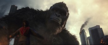 Movie still from “Godzilla vs. Kong” (2021), directed by Adam Wingard – A gorilla's face in the sky; Close Up shot, Low angle