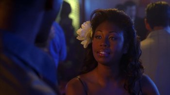 Movie still from “The Brothers” (2001), directed by Gary Hardwick – A beautiful young woman with a flower in her hair; Close Up shot, Over the shoulder angle