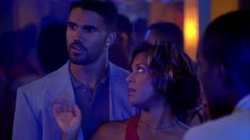 Movie still from “The Brothers” (2001), directed by Gary Hardwick – A man and a woman standing next to each other; Medium shot, Over the shoulder angle