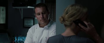 Movie still from “The Burning Plain” (2008), directed by Guillermo Arriaga – A man and a woman are looking in the same mirror; Close Up shot, Over the shoulder angle