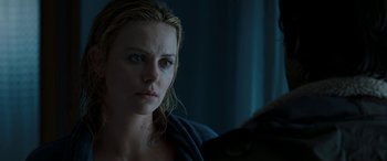 Movie still from “The Burning Plain” (2008), directed by Guillermo Arriaga – A person looking at a mirror; Close Up shot, Over the shoulder angle