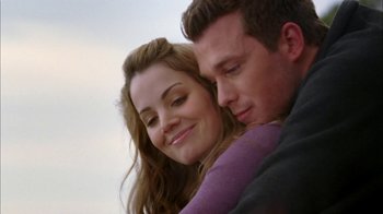 Movie still from “The Butterfly Effect 2” (2006), directed by John R. Leonetti – A man and a woman embracing each other; Close Up shot, Low angle