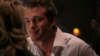 Movie still from “The Butterfly Effect 2” (2006), directed by John R. Leonetti – A person wearing a white dress shirt; Close Up shot, Over the shoulder angle