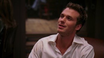 Movie still from “The Butterfly Effect 2” (2006), directed by John R. Leonetti – A person wearing a white shirt; Close Up shot, Over the shoulder angle