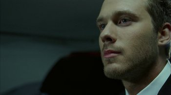 Movie still from “The Butterfly Effect 2” (2006), directed by John R. Leonetti – A person with a beard looking into the distance; Close Up shot, Low angle