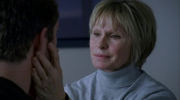 Movie still from “The Butterfly Effect 2” (2006), directed by John R. Leonetti – An older woman sitting in front of a younger man; Close Up shot, Over the shoulder angle