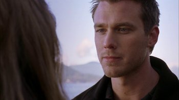 Movie still from “The Butterfly Effect 2” (2006), directed by John R. Leonetti – A man's face as a woman looks on; Close Up shot, Over the shoulder angle