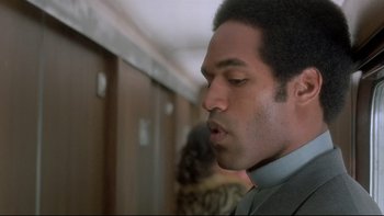 Movie still from “The Cassandra Crossing” (1976), directed by George P. Cosmatos – A person in a room; Close Up shot, Low angle