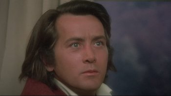 Movie still from “The Cassandra Crossing” (1976), directed by George P. Cosmatos – A person with long brown hair; Close Up shot, Low angle