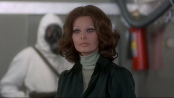 Movie still from “The Cassandra Crossing” (1976), directed by George P. Cosmatos – A person wearing a jacket; Close Up shot, Over the shoulder angle