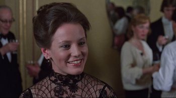 Movie still from “The Changeling” (1980), directed by Peter Medak – A person wearing a dress; Close Up shot, Over the shoulder angle