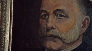 Movie still from “The Changeling” (1980), directed by Peter Medak – A painting of a man with a beard and a mustache; Extreme Close Up shot, Low angle