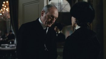 Movie still from “The Childhood of a Leader” (2015), directed by Brady Corbet – A man and a woman are talking to each other; Close Up shot, Over the shoulder angle