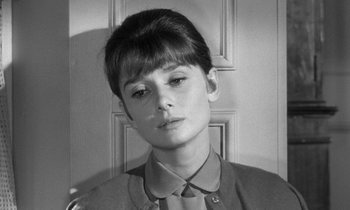 Movie still from “The Children's Hour” (1961), directed by William Wyler – A black - and - white photo of a young woman; Close Up shot, High angle