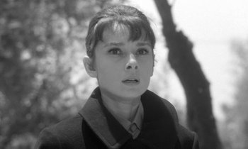 Movie still from “The Children's Hour” (1961), directed by William Wyler – Black and white photograph of a young boy looking at the camera; Close Up shot, Low angle